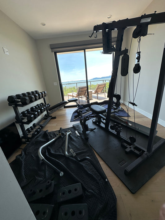 Fitness equipment repair specialist diagnosing issues with gym equipment. 9